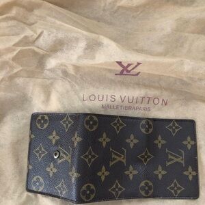 Louis Vuitton Bi-Fold Wallet ( Authentic/purchased from Saks Fifth Avenue )